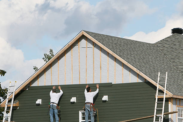 Professional Siding Installation technician working in Reinholds, PA